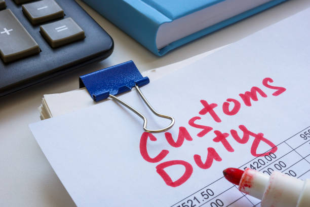 stack of papers with customs duty label.