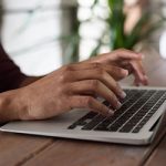 person using macbook 150x150.jpg person using macbook 150x150.jpg